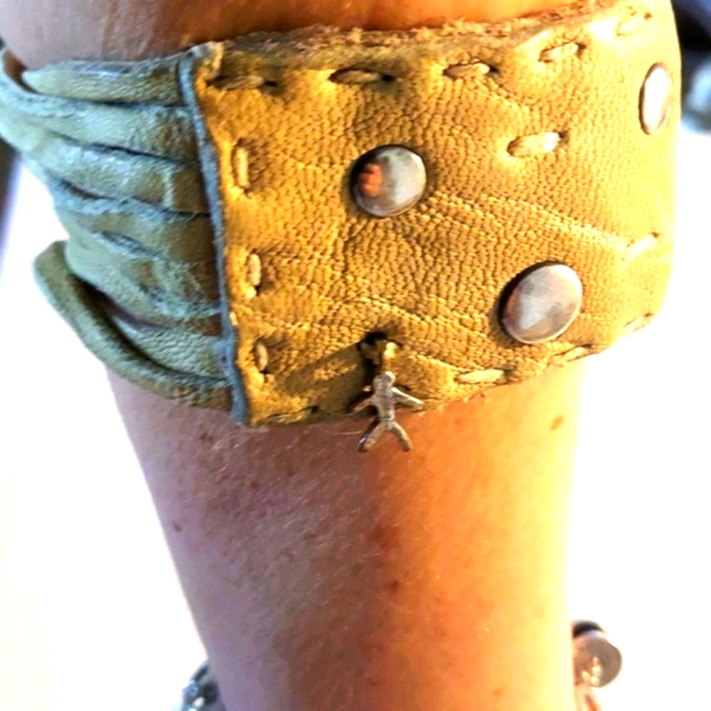Upper arm leather bracelet handmade by artist